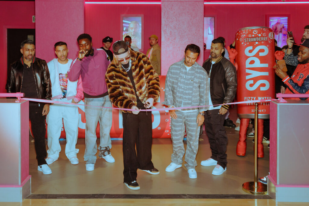 Guests cutting the pink ribbon at the Archie’s launch in Manchester