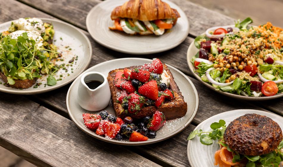 Brunch spread laid out on a wooden table