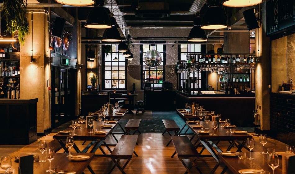 Empty restaurant venue set with long benches